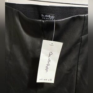 Never worn bell bottom faux leather, high-waisted pants.